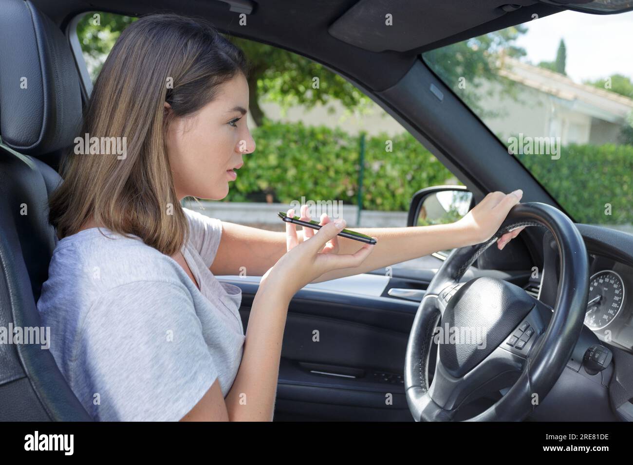Using Wheel wom on the phone while using wheel Stock Photo - Alamy