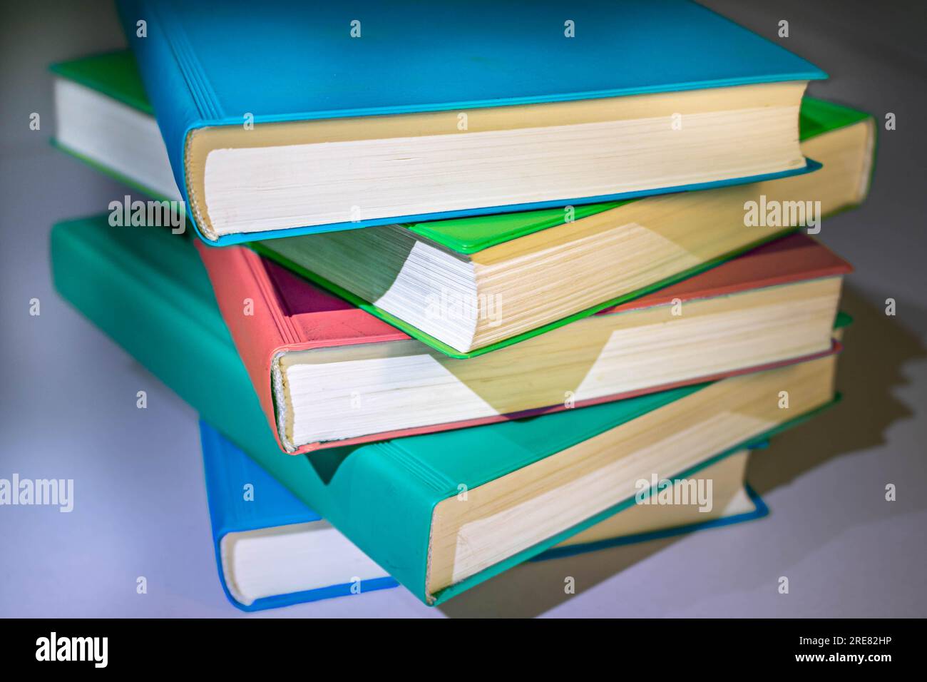 a colorful stack of 5 Books Stock Photo