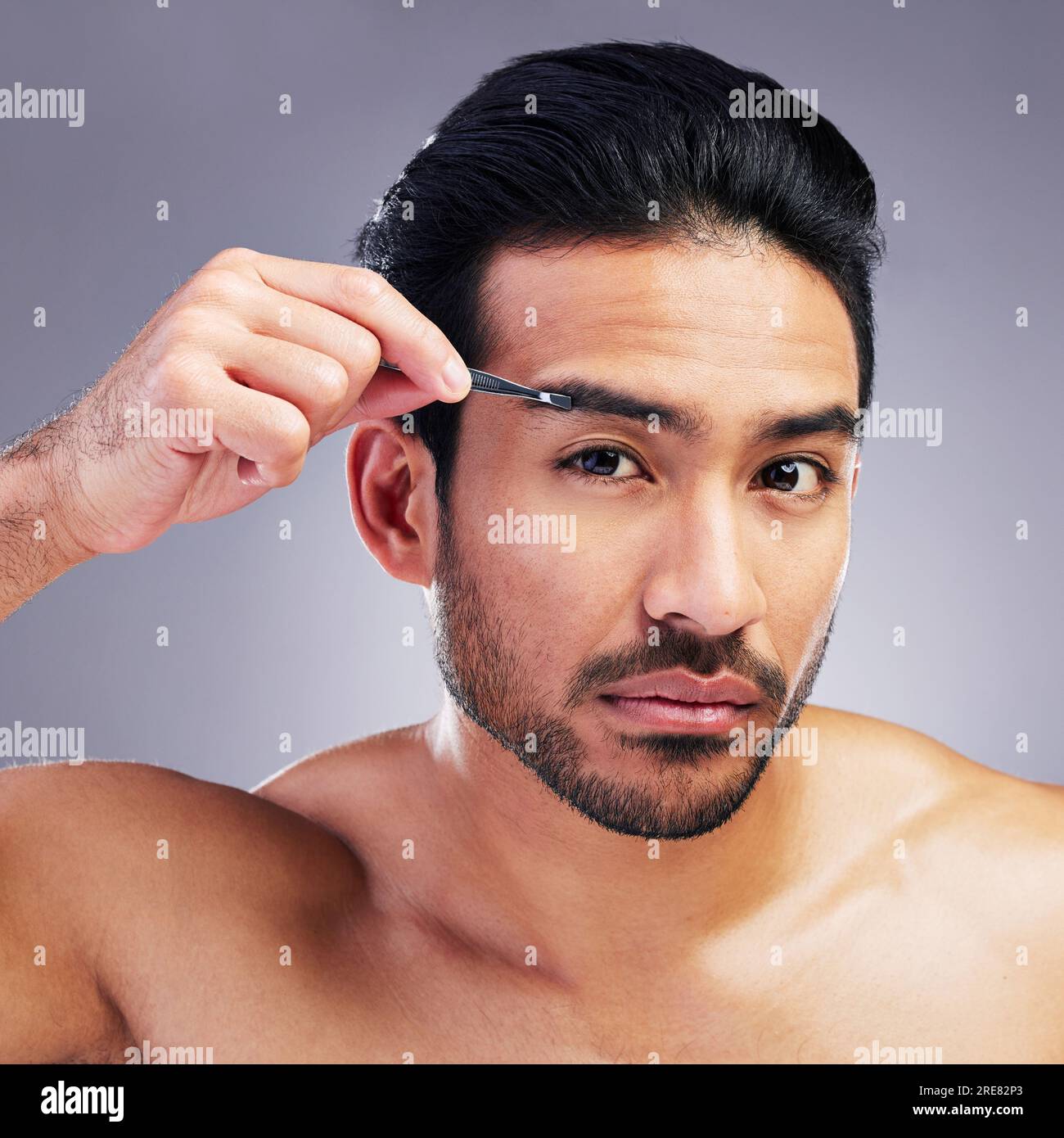 Tweezer, eyebrow and portrait of a man in studio for beauty, hygiene or