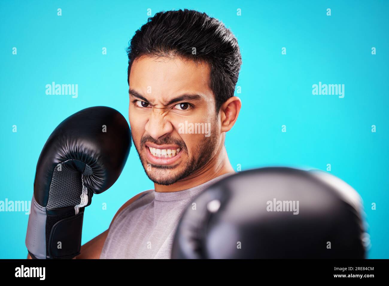 Angry boxer man, studio portrait and punch for workout, training and ...