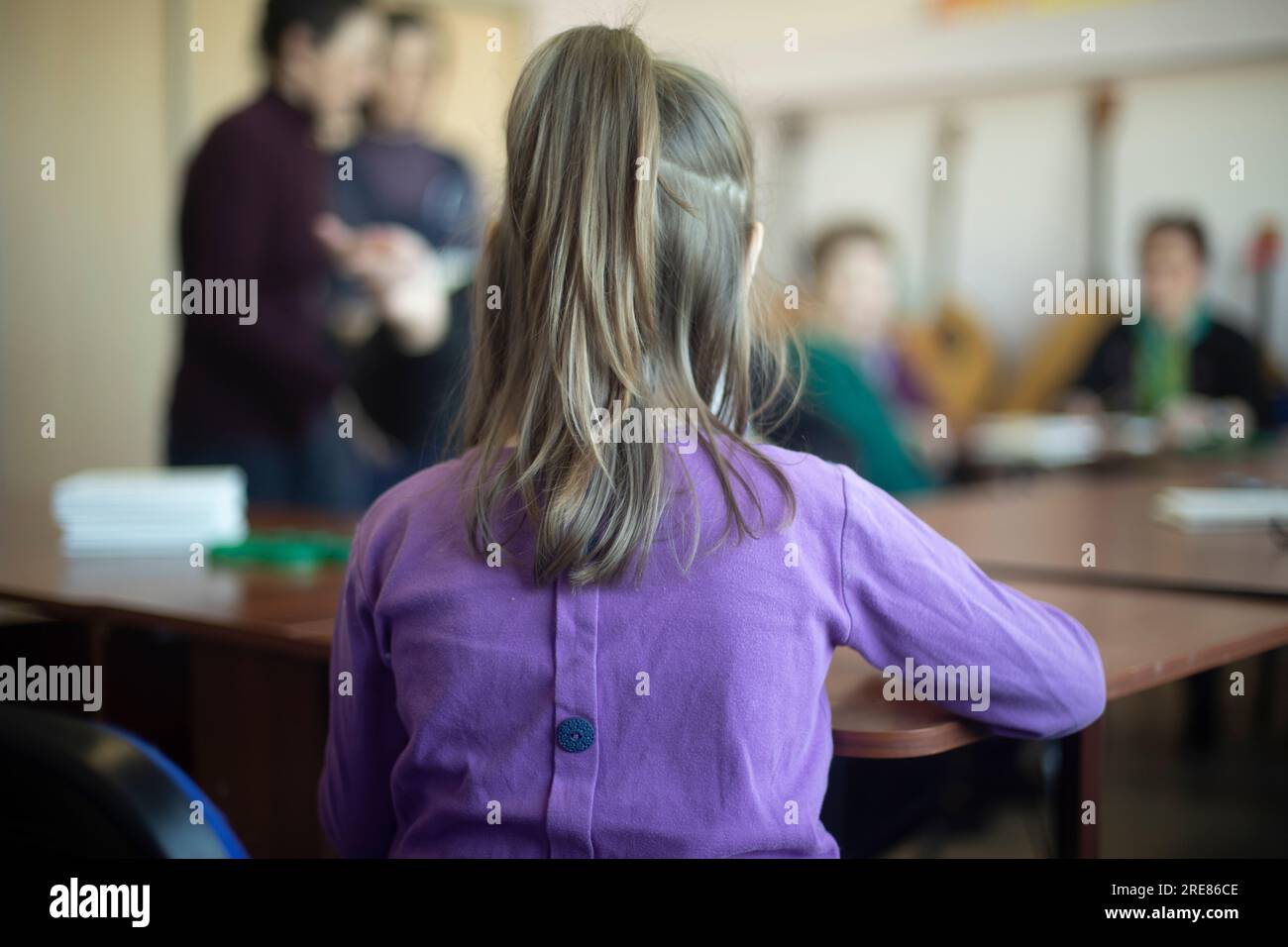 Child in classroom. Drawing lesson. Creative development of child. Girl ...