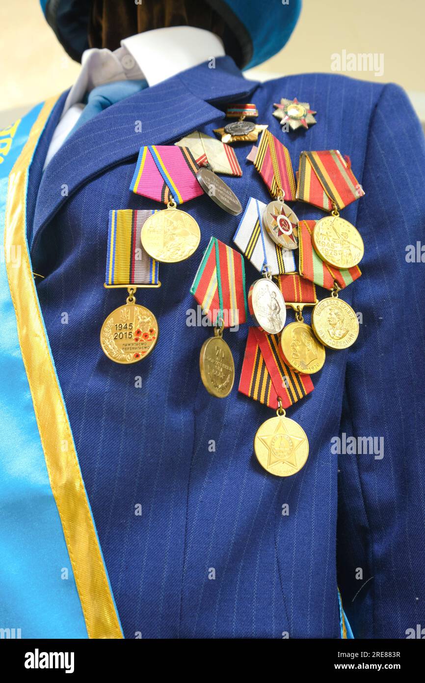Close up view of a military officer's coat with many, a lot of hanging