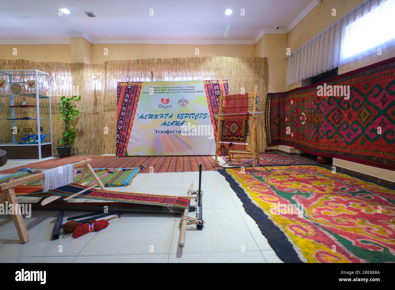 A display of a traditional weaving loom for bright, colorful textiles. At the local Handicraft
