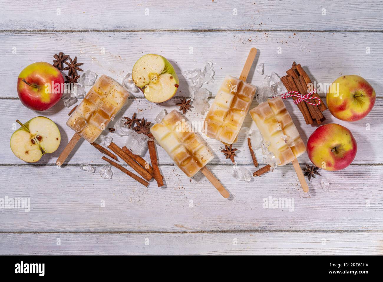 Apple pie ice cream popsicles on a stick. Homemade lollipops with apple pie spicy flavor, on