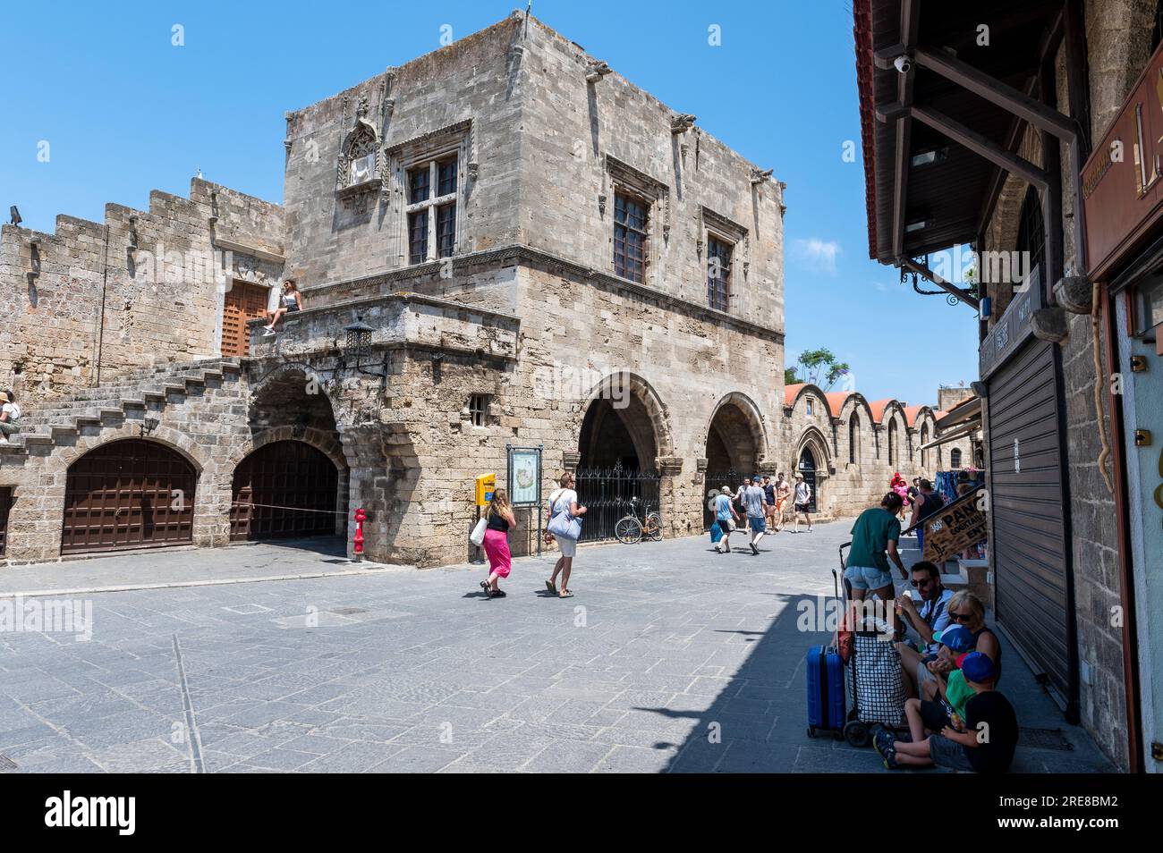 Medieval City of Rhodes being visited by summer tourists Stock Photo