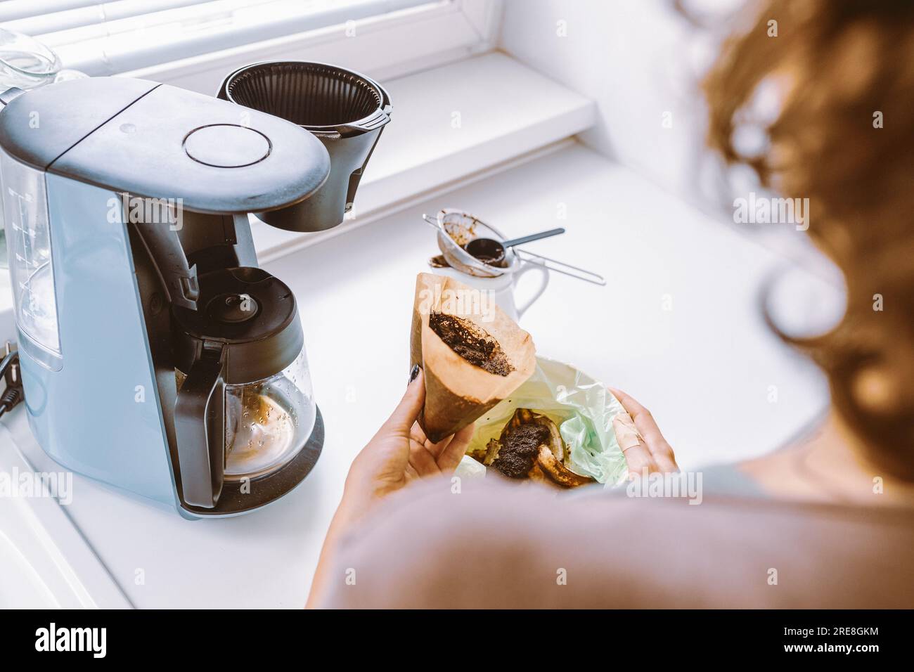 Throwing Away Used Coffee Ground Stock Photo Alamy