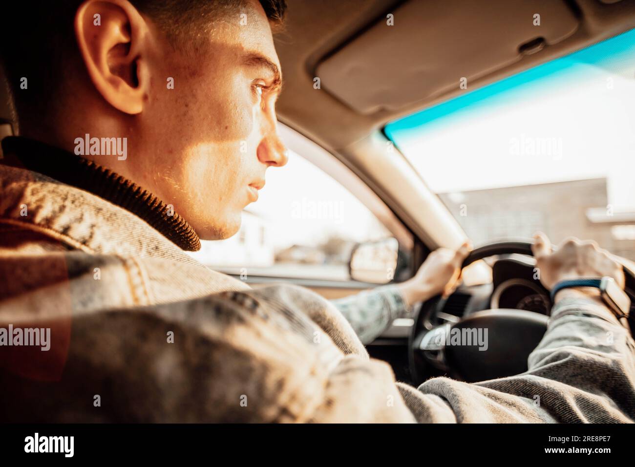 Man at steering wheel hi-res stock photography and images - Alamy