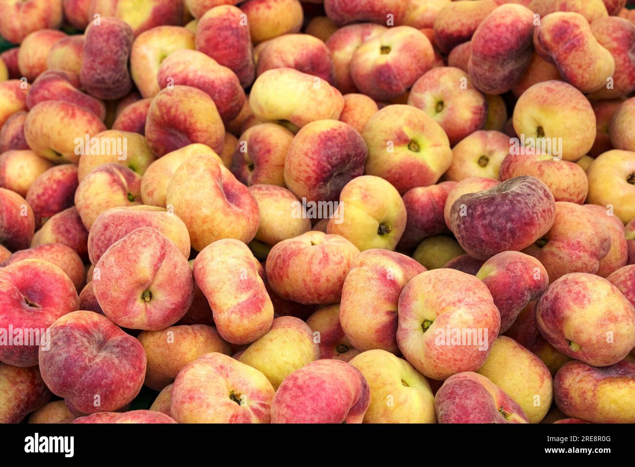 Showcase with fig peaches. Food market, closeup Stock Photo Alamy