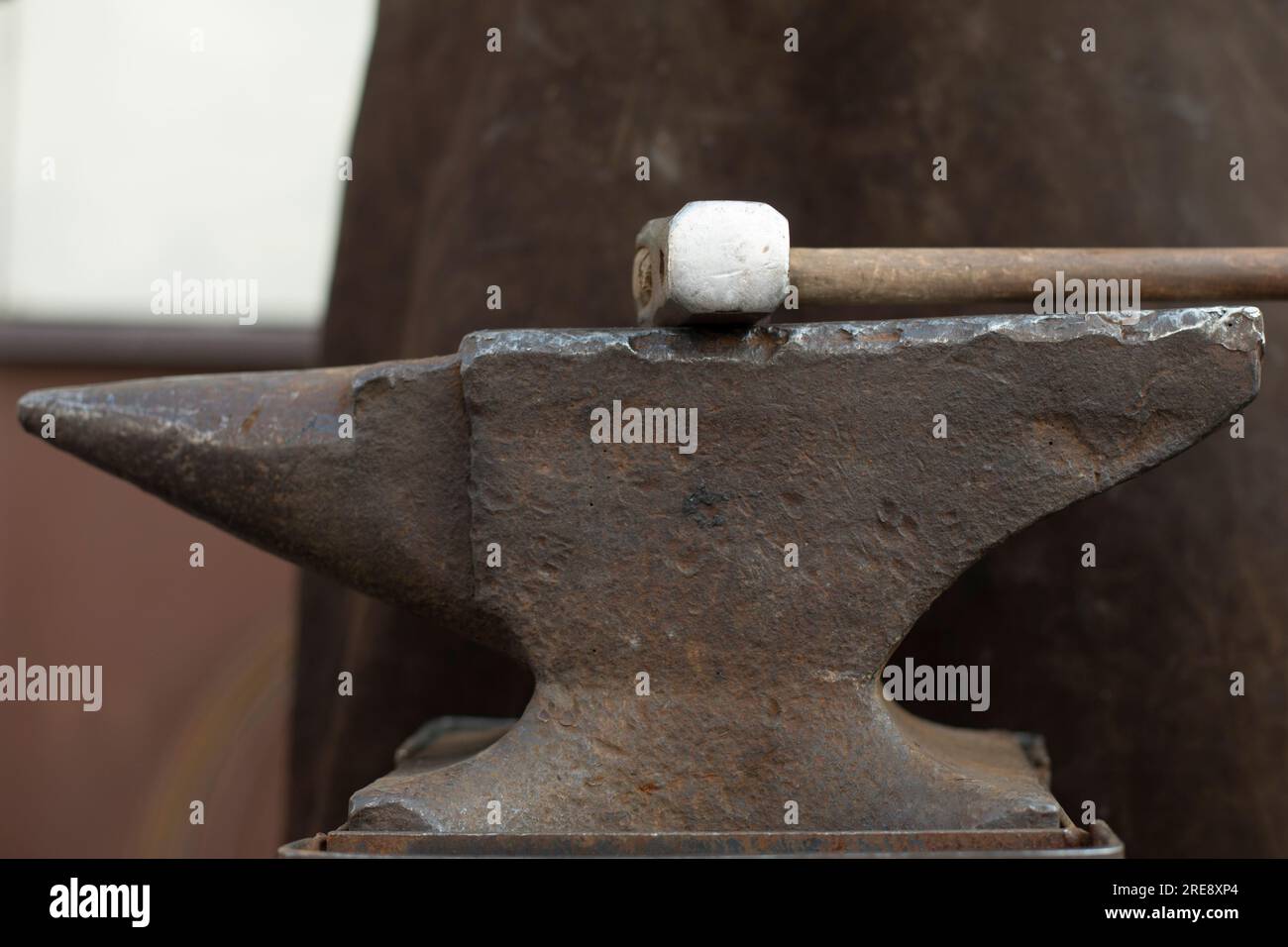 Blacksmith hits anvil. Hammer and anvil. Metal Processing Details