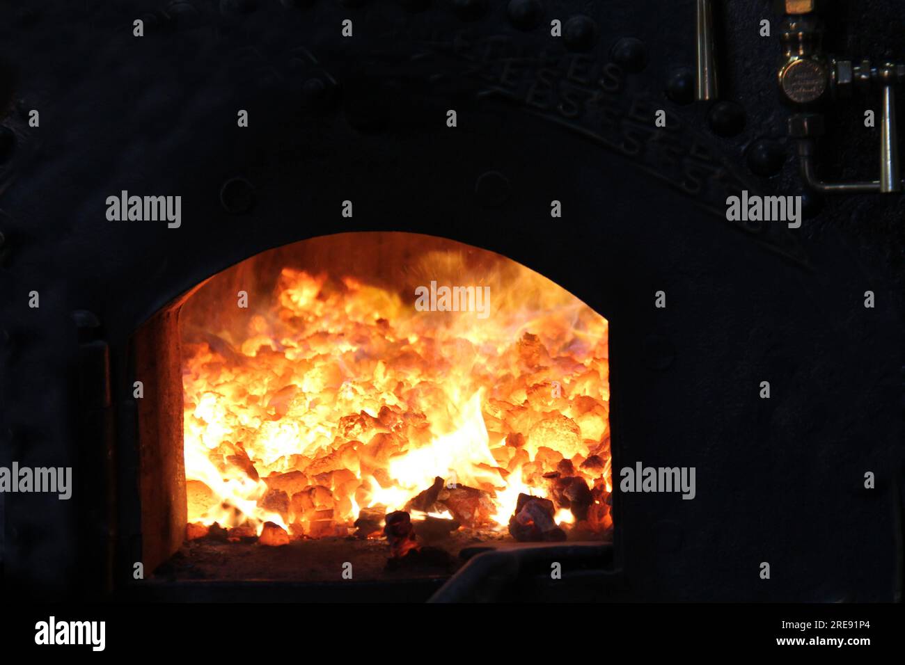 The Intense Fire of a Vintage Coal Fueled Steam Boiler Stock Photo - Alamy
