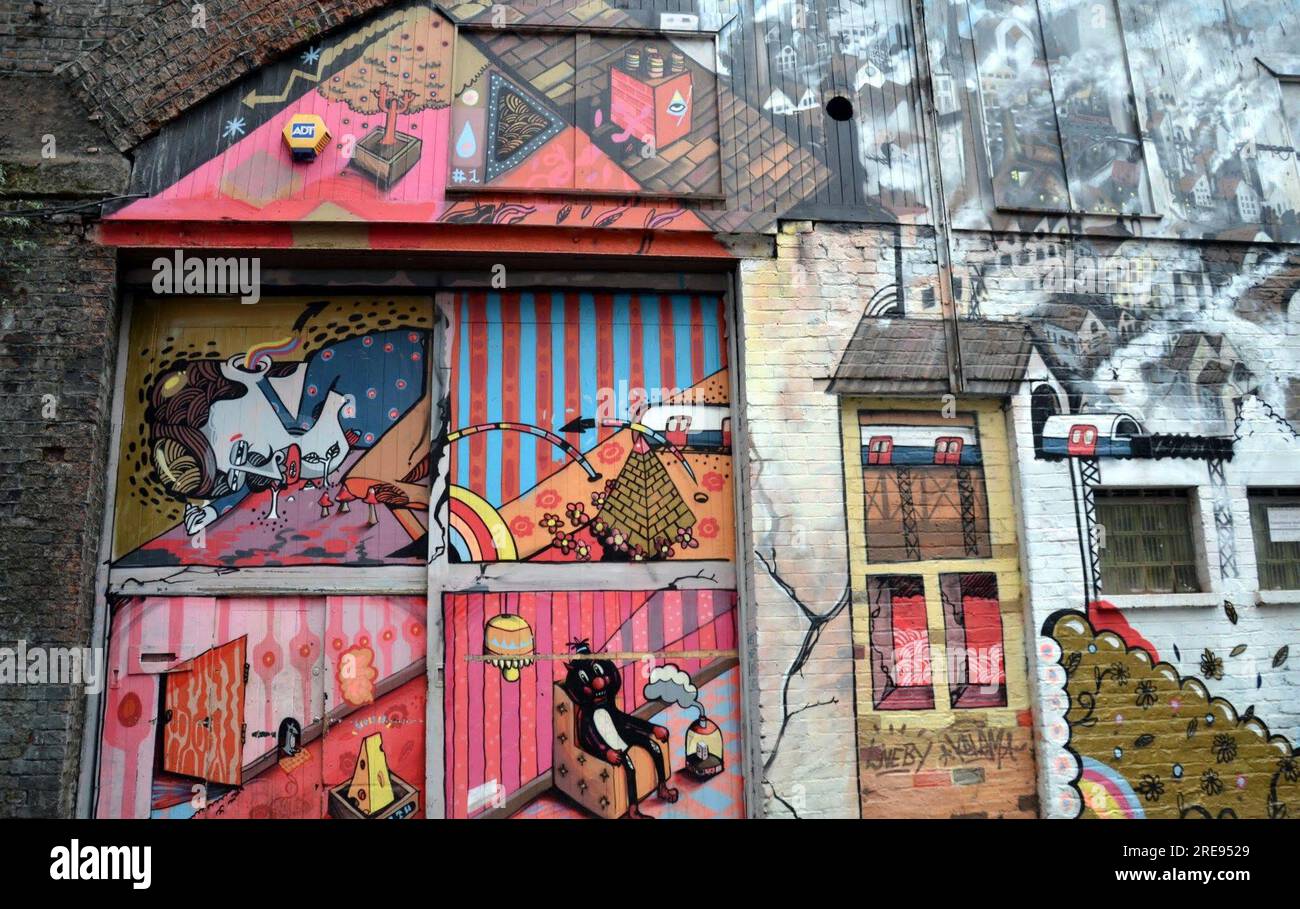 street art, paintings cover old walls near Oxford Road rail station, urban art, archival: Manchester, UK, Stock Photo