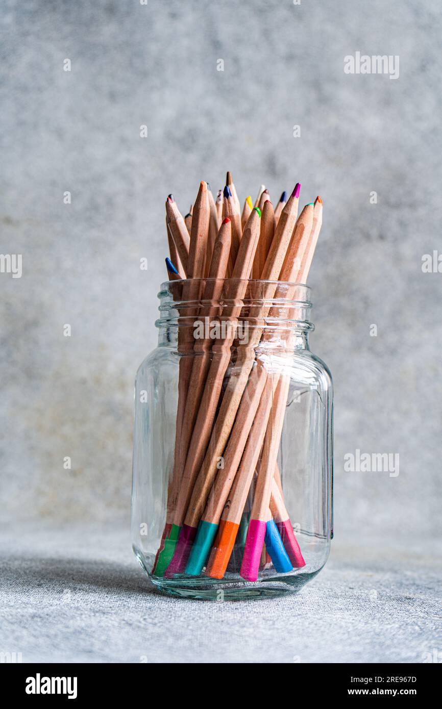 Glitter Colored Pencils in a Glass Jar Stock Image - Image of