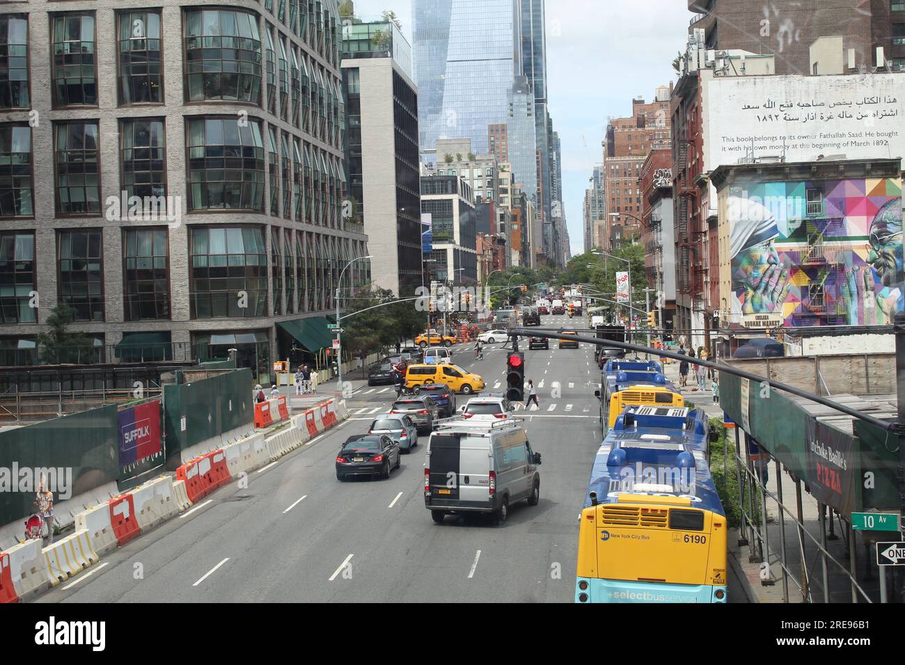 A photo of cars, school buses and taxis driving along a road in New York City during busy hours and a cityscape of New York city. Stock Photo