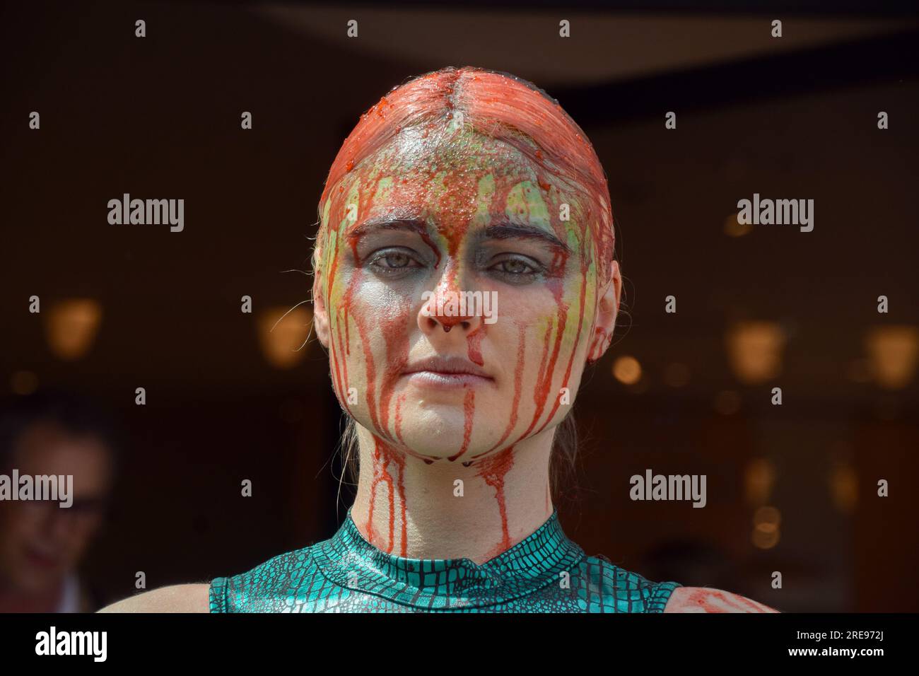 London, England, UK. 26th July, 2023. Vegan activist TASH PETERSON and PETA  staged a protest outside the Hermes store on Bond Street, calling on the  luxury brand to end the use of