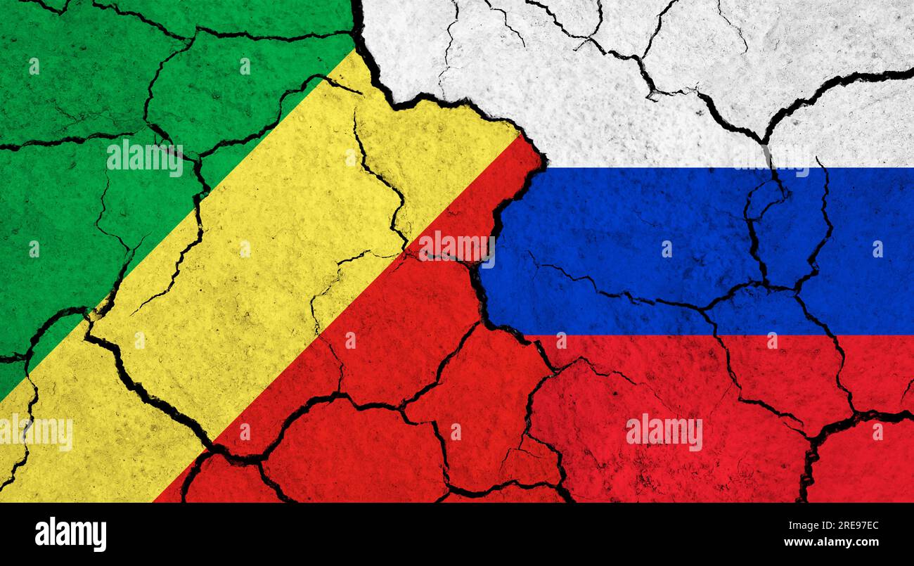 Flags of Congo and Russia on cracked surface politics, relationship