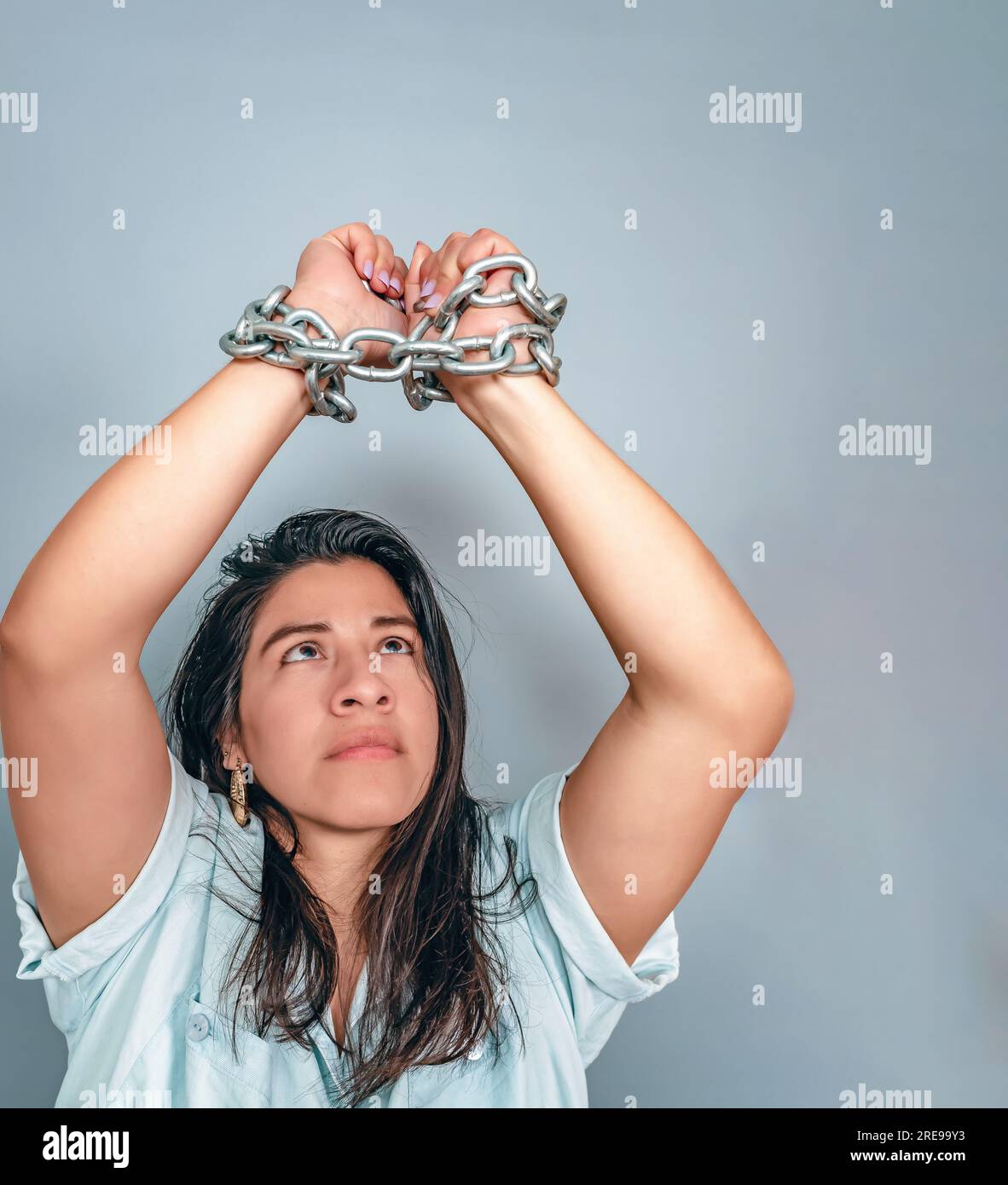 Woman in chains hi-res stock photography and images - Alamy