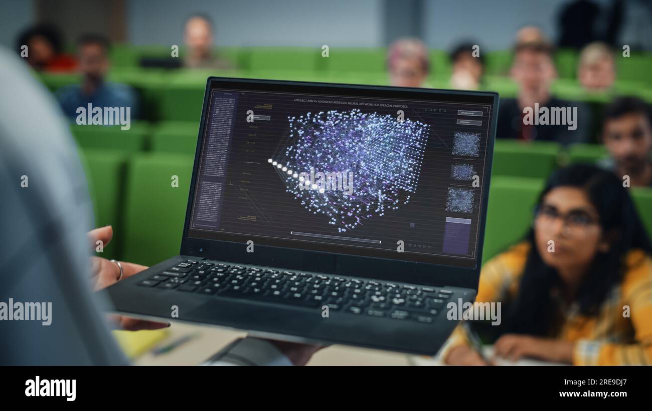 Close Up of an University Professor Using a Laptop Computer with Artificial Intelligence Materials. Female Teacher Giving a Lecture Stock Photo