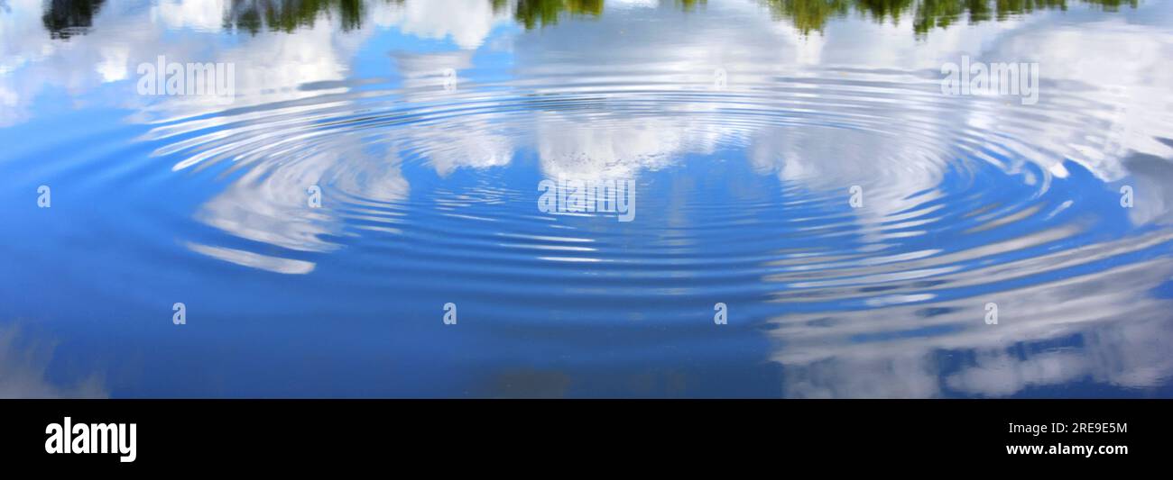 Disturbance in the Yahara River causes a ripple to grow on its' surface