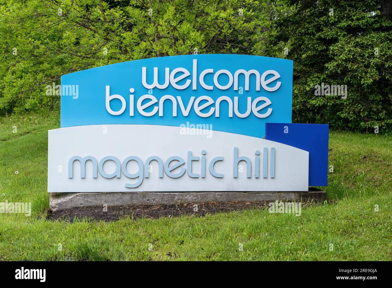 Magnetic Hill is a tourist attraction in Moncton New Brunswick where visitors are subject to an optical illusion that makes them feel that their vehic Stock Photo