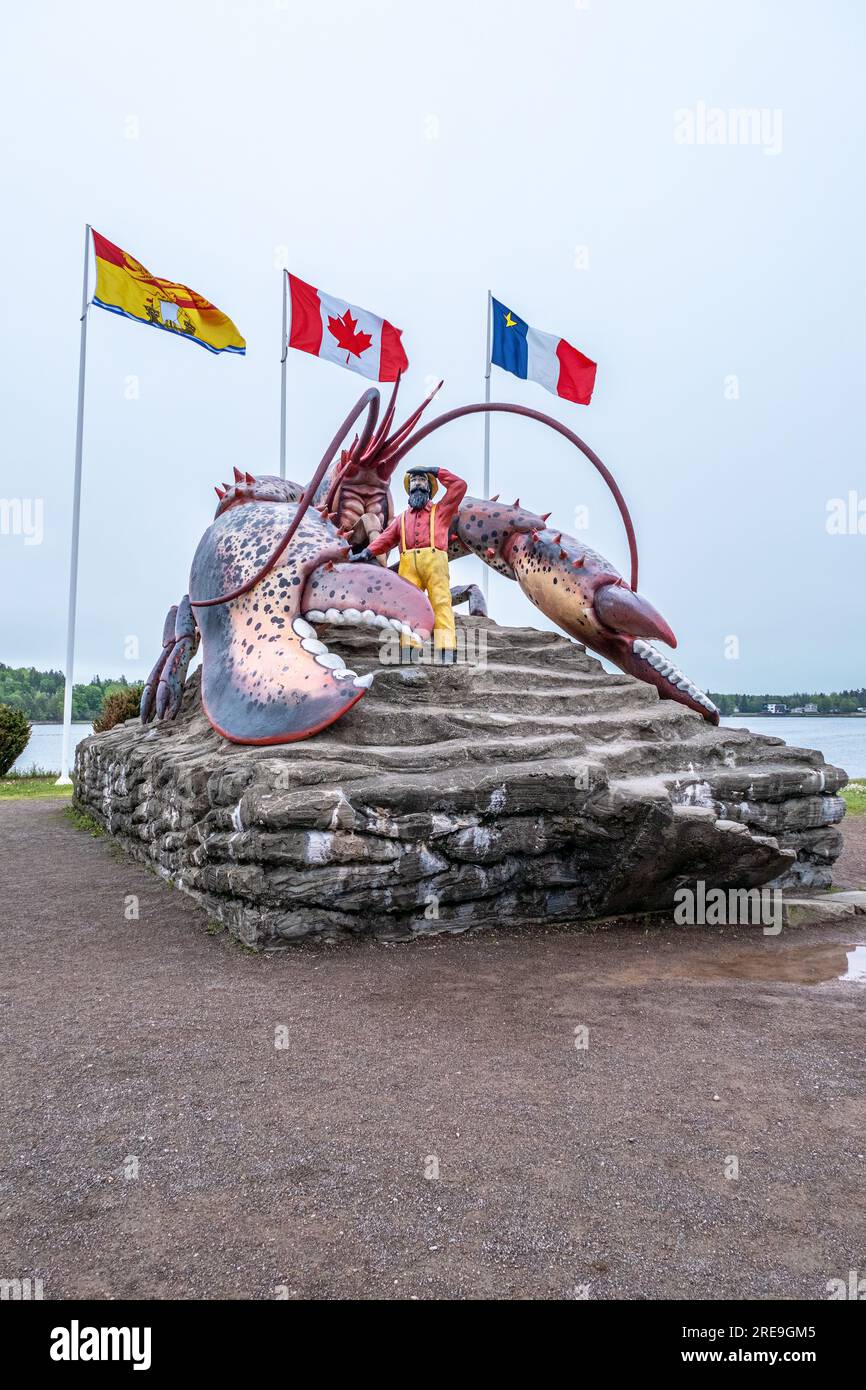 A statue of the Worlds Largest Lobster is a tourist attraction commissioned by the Town of Shediac New Brunswick to promote its lobster fishery. Stock Photo