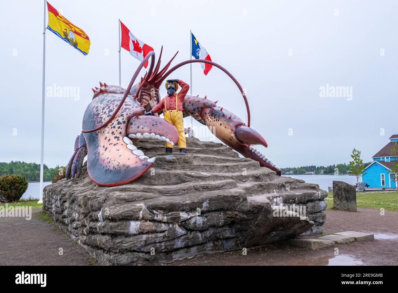 A statue of the Worlds Largest Lobster is a tourist attraction commissioned by the Town of Shediac New Brunswick to promote its lobster fishery. Stock Photo