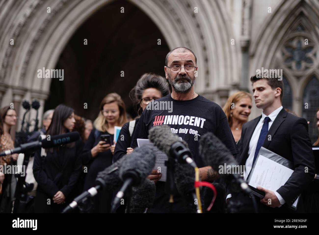 Andrew Malkinson, who served 17 years in prison for a rape he did not commit, reads a statement outside the Royal Courts of Justice in London, after being cleared by the Court of Appeal. Picture date: Wednesday July 26, 2023. Stock Photo