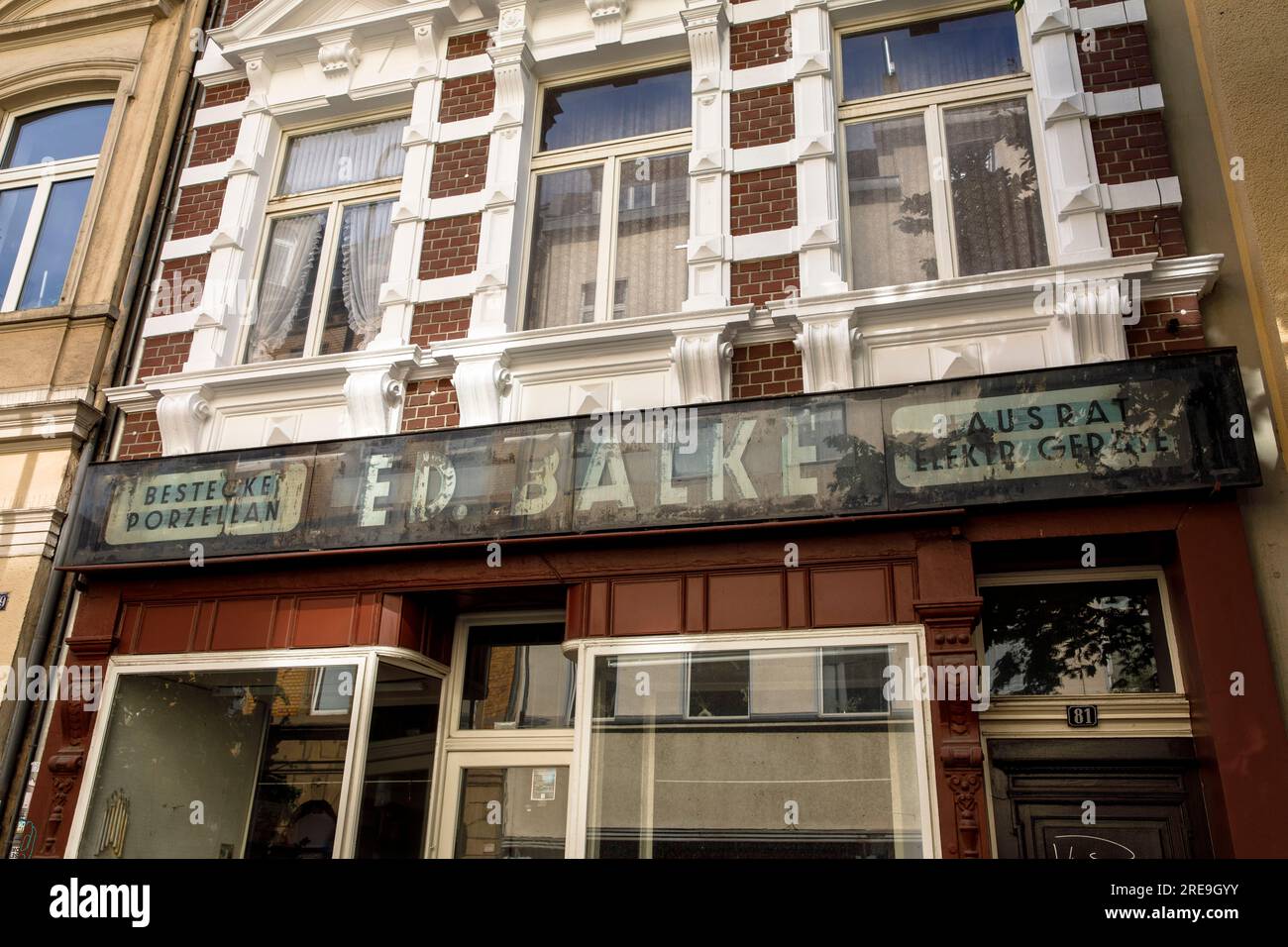 old sign at the household goods store Ed. Balke on the street ...
