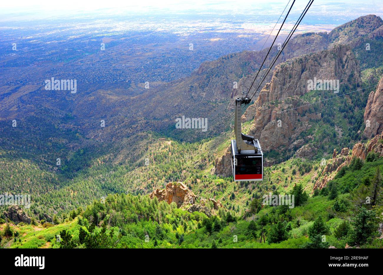 Sandia Tram slowly ascends from the base of the Sandia Mountains to the ...