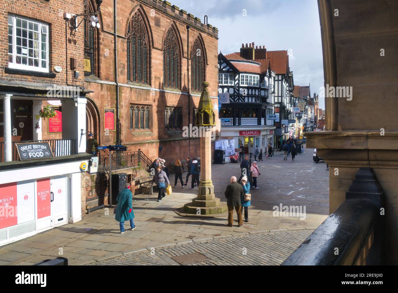 Chester Cross is a medieval stone cross in the centre of the city, set at The meeting of four major Streets.  Chester City, Cheshire, England, UK Stock Photo