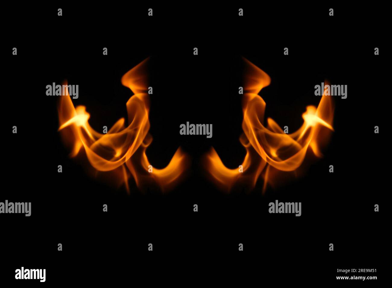 Wings in flame. Wings in Flame and Fire. Black background. Copy space. Out of focus Stock Photo