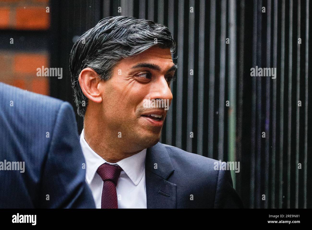 London, UK. 26th July, 2023. Prime Minister Rishi Sunak exits following his appearance at the Infected Blood Inquiry today, held near Aldwych in central London. The inquiry is ongoing.The PM is said to face pressure from bereaved families accept compensation recommendations by the inquiry's chairman, which were made three months ago. Sunak arrived and left via the Civil Service Club, connected to the back of the building and venue, rather than the front entrance where he would have faced the press, as well as bereaved families and protesters. Credit: Imageplotter/Alamy Live News Stock Photo