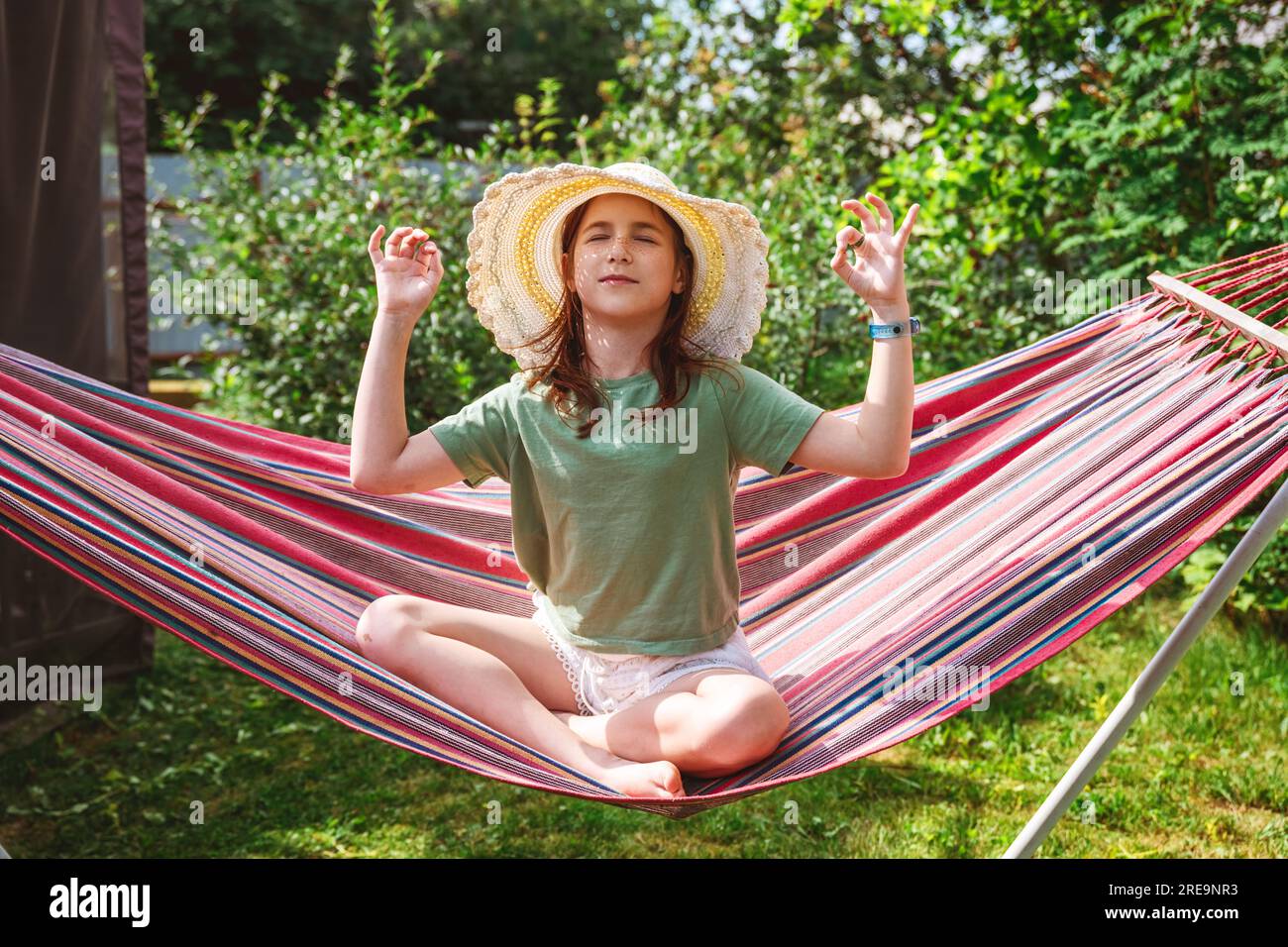 Outdoor Recreation In Summer Outside The City Cottage Cute Teenage Girl Sitting On A Hammock 5301