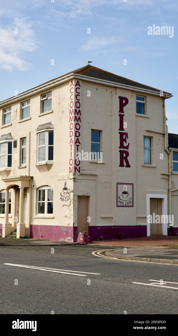 Porthcawl, Wales - June 19 2023: The Boathouse sits alongside the closed Pier Hotel, a prime sea front location subject to planning discussions. Stock Photo
