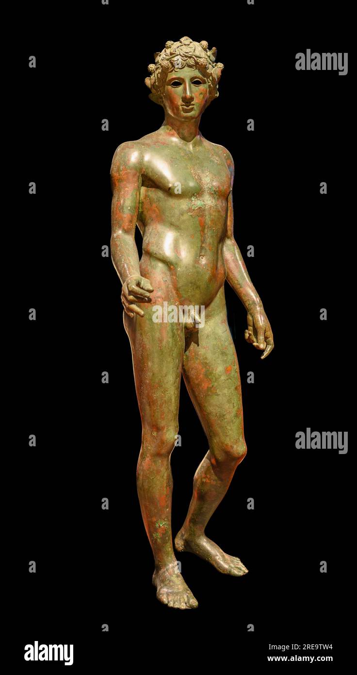Bronze statue of Ephebo crowned with ivy,  frorm Volubilis in Marocco. 1st century AD.  Musee de l'Histoire et des Civilisations, Rabat, Morocco Stock Photo
