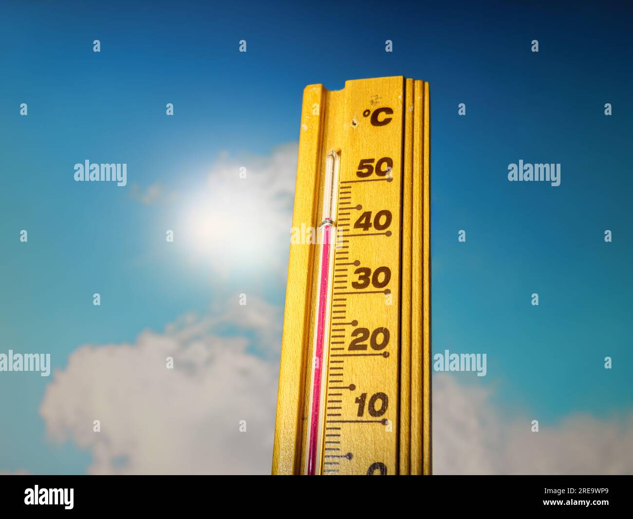 Hot summer day, the thermometer displays a high heatwave temperature of 43 degrees Celsius. Extreme weather, global climate change . Stock Photo