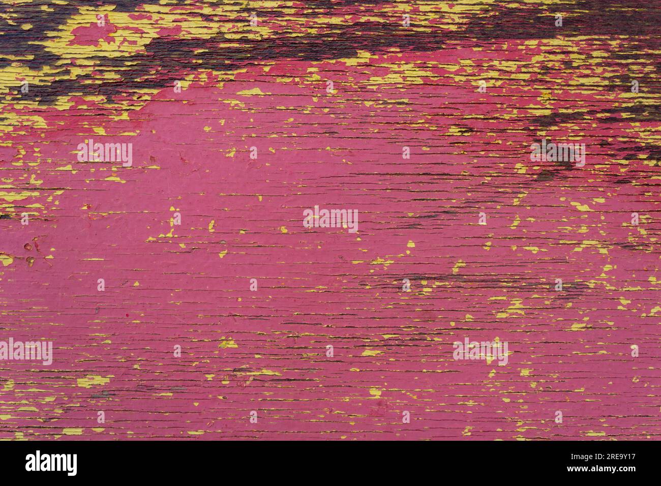 Peeling paint from a wooden board - surface texture. Stock Photo
