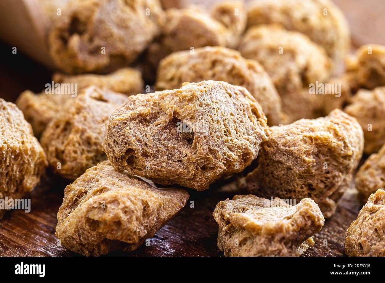 Granulated PINK SOY PROTEIN. used in vegan foods as a meat substitute