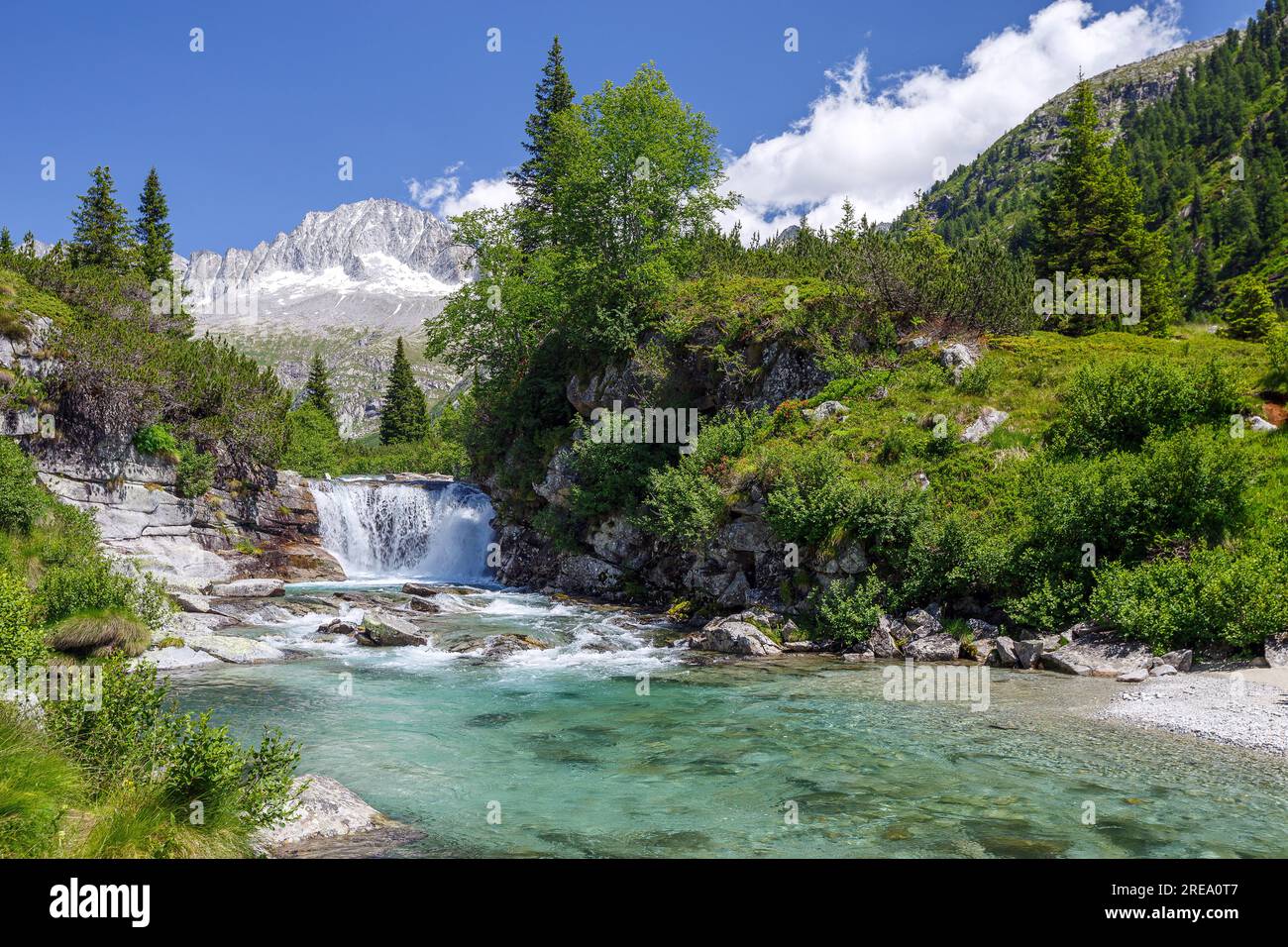 River Chiese, waterfall. Val di Fumo alpine valley. Carè Alto mountain peak. Trentino. Italian Alps. Europe. Stock Photo