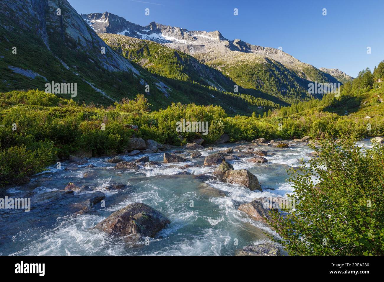 Sunlight at sunrise. Val di Fumo alpine valley. Trentino. Italian Alps. Europe. Stock Photo