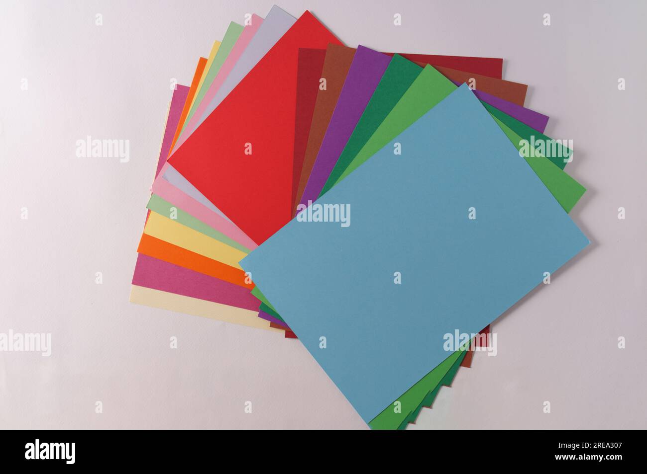 Stack of colorful paper of different colors ,top view..Minimal concept. Stock Photo