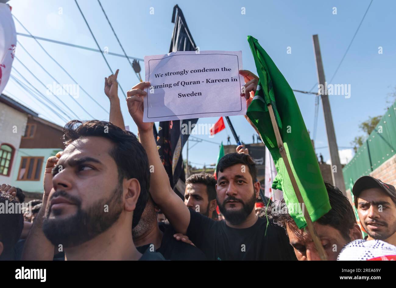 Srinagar, India. 26th July, 2023. A Kashmiri Shia Muslim man hold a ...