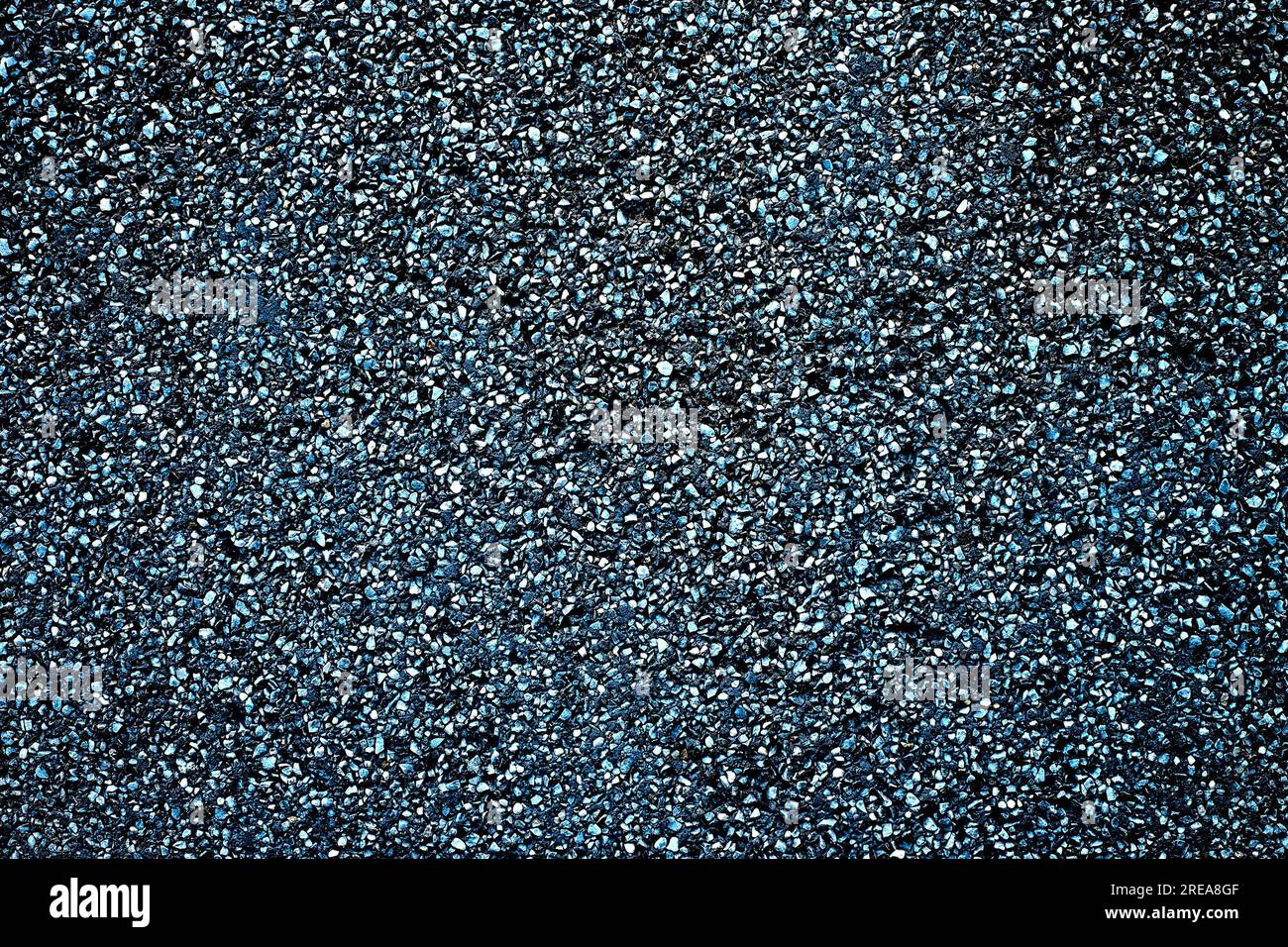 Perfect mottled empty dark background with lighter flecks. Stock Photo
