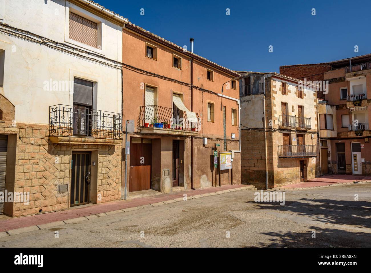 Houses of the Bassa square, in Bovera (Les Garrigues, Lleida, Catalonia, Spain) ESP: Casas de la plaza de la Bassa, en Bovera (Lérida, España) Stock Photo