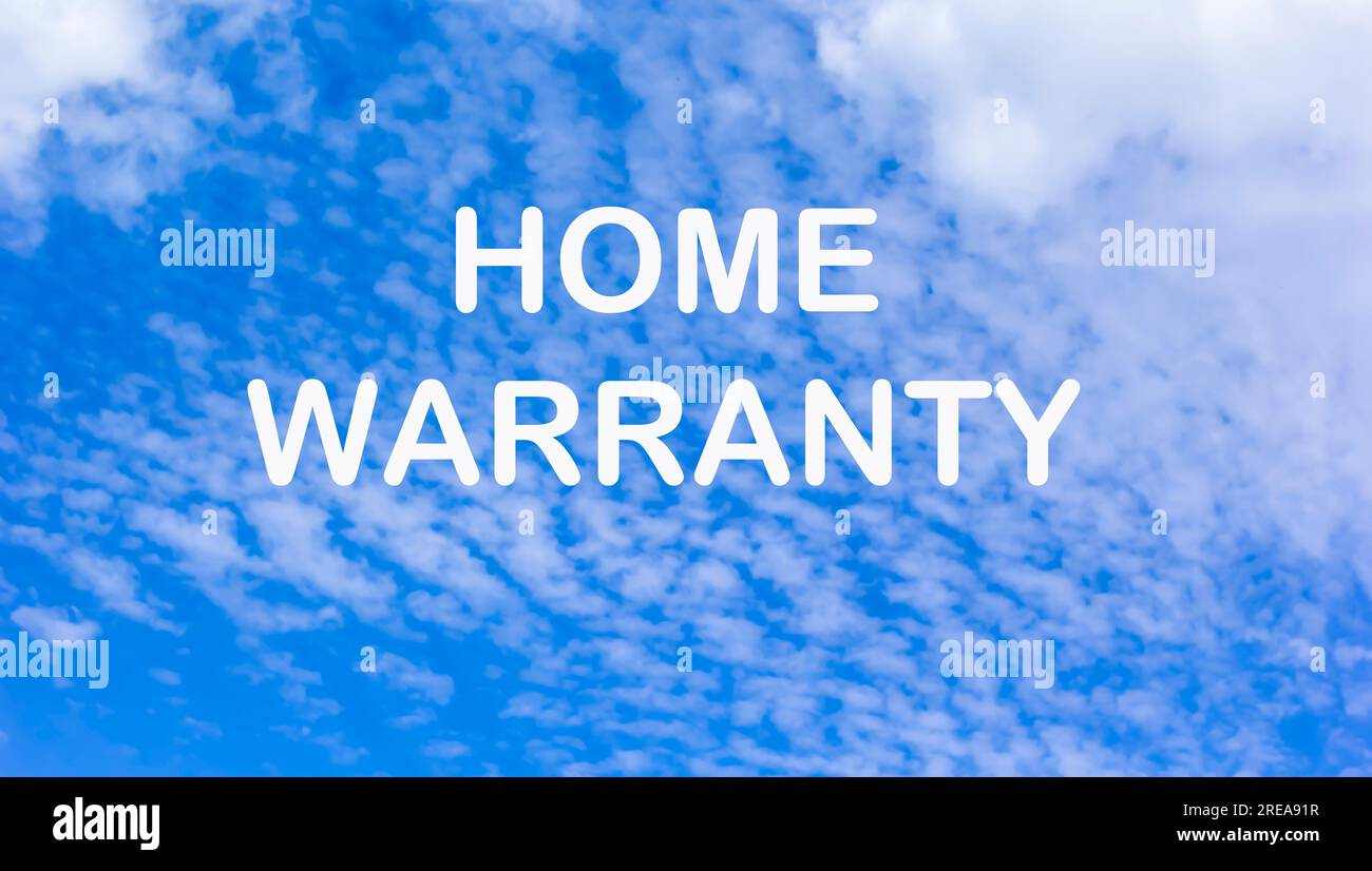 On a beautiful sky with clouds and text HOME WARRANTY Stock Photo