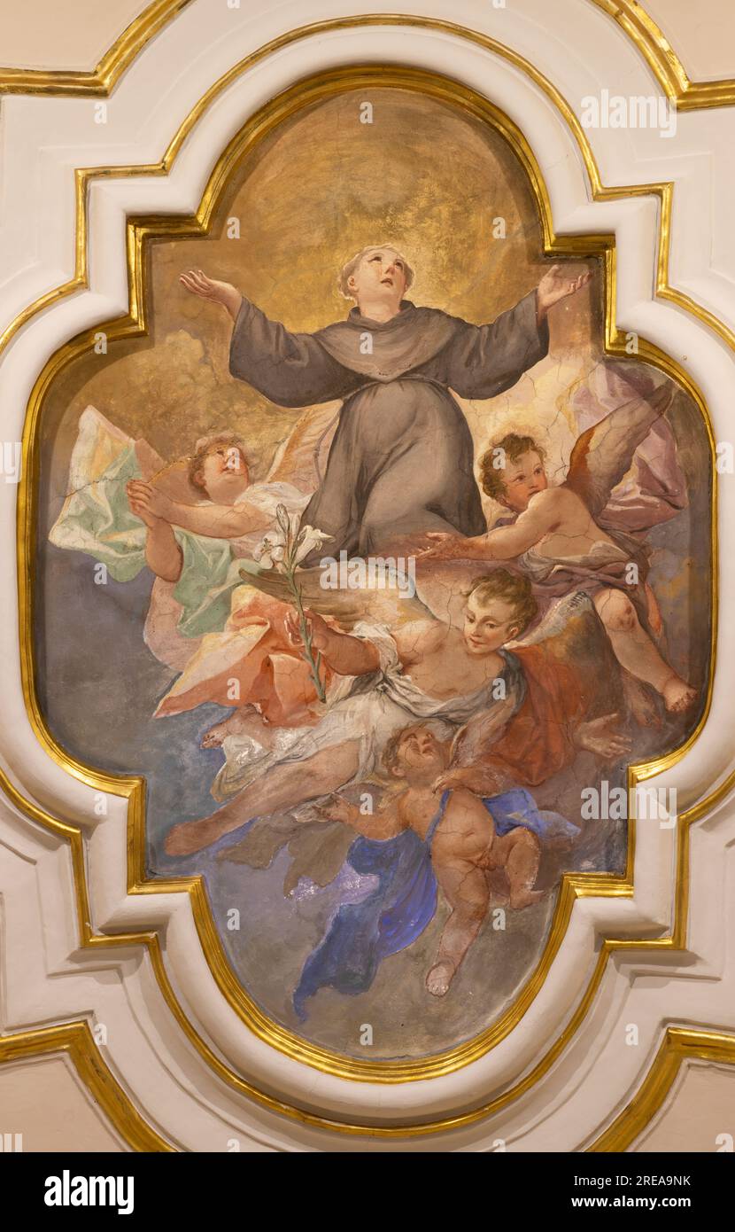 NAPLES, ITALY - APRIL 20, 2023: The fresco of Apotheosis of St. Anthony of Padua in the church Chiesa di Santa Caterina a Chiaia by unknown artist Stock Photo