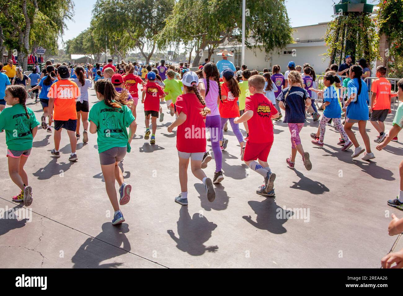 Costa Mesa, California, USA. 5th May, 2018. 10-year-old multiracial runners leave the starting line as the race begins at a community track event in Costa Mesa, CA. (Credit Image: © Spencer Grant/ZUMA Press Wire) EDITORIAL USAGE ONLY! Not for Commercial USAGE! Stock Photo