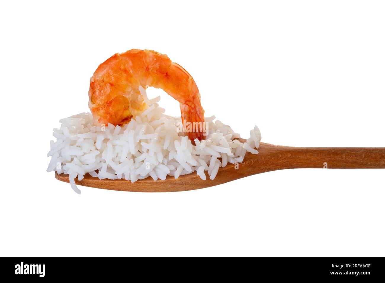 Fried shrimp on white boiled rice on wooden spoon isolated on white with clipping path included Stock Photo