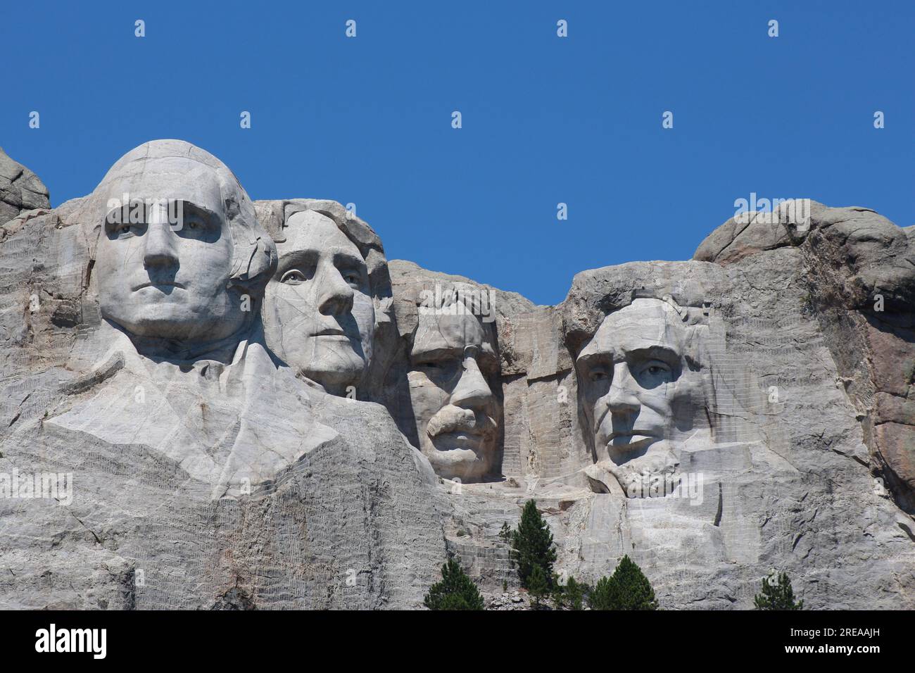 Majestic Mount Rushmore with clear blue sky on a warm summer day Stock Photo
