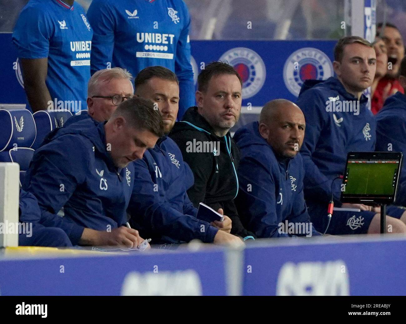 Rangers manager Michael Beale (centre) and backroom staff in the dugout