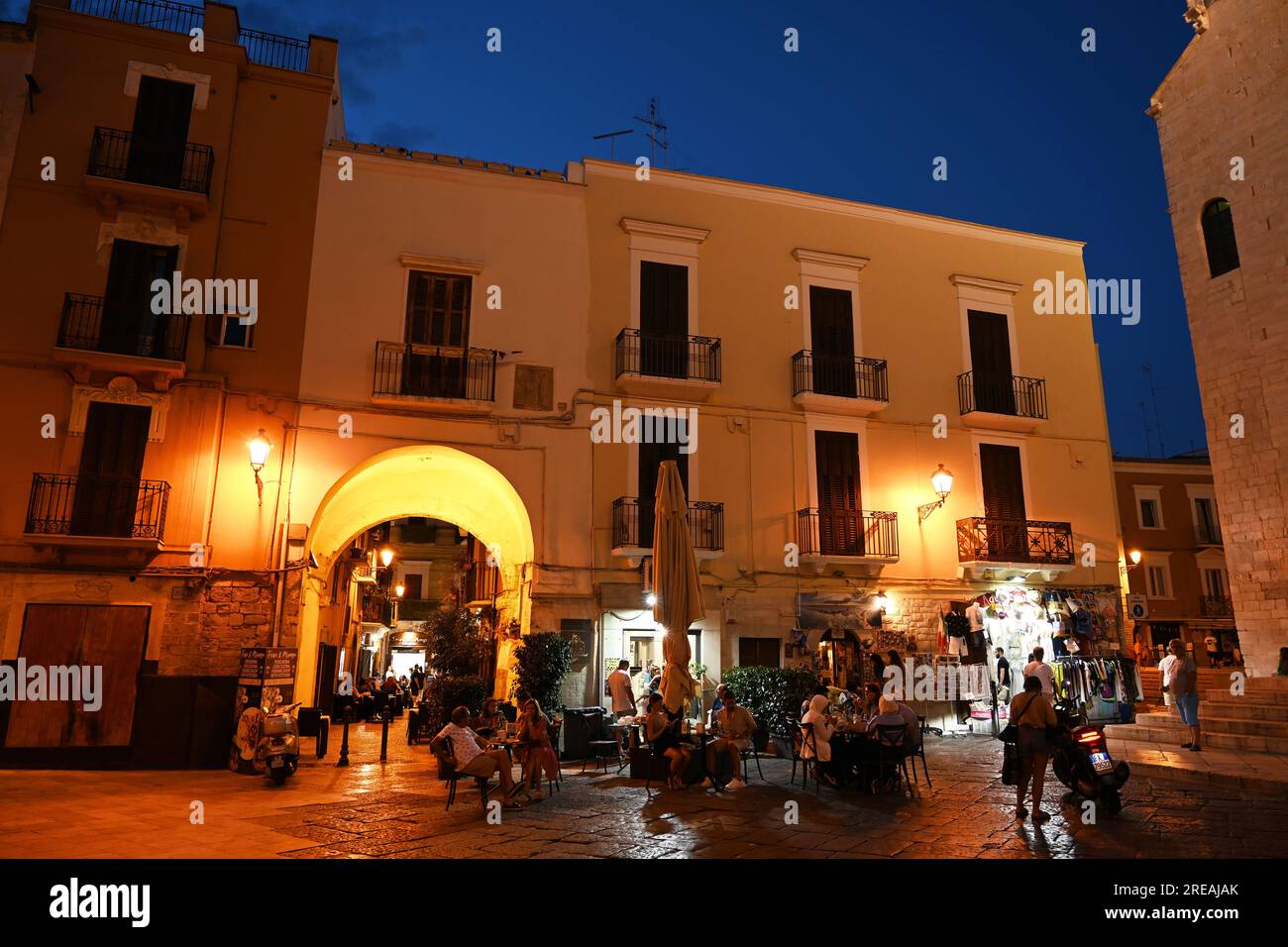 Twilight on a square with restaurants Stock Photo